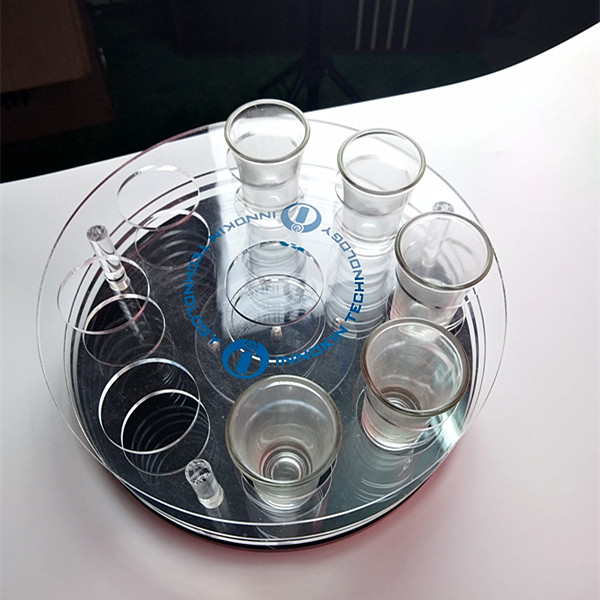 Round rotating acrylic shot holder